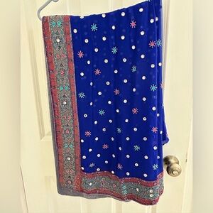 Ornate Indian dupatta with embroidered border.